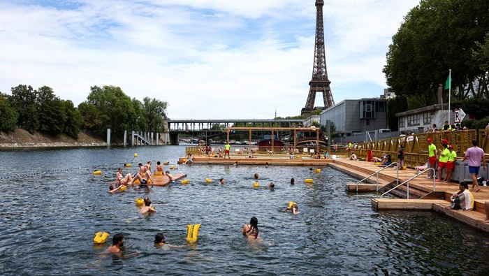 1751952137986-berenang-di-sungai-seine-dekat-eiffel-kini-jadi-kenyataan-1751871640047_169