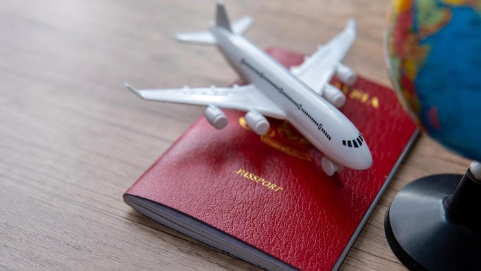 1765775260411-ilustrasi-paspor-1760674667870_169