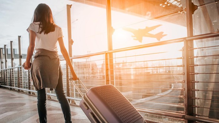 1767956829178-ilustrasi-perempuan-di-bandara-1740017408008_169